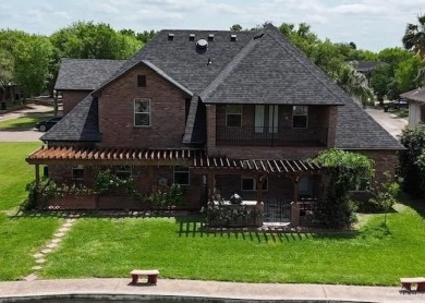 HOME NEVER FLOODED!!! 
Experience serene pond-side living in on Harlingen Country Club in Texas - for sale on GolfHomes.com, golf home, golf lot