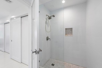 Welcome to this beautifully updated second-floor residence on Quail Ridge Golf Course and Country Club in Florida - for sale on GolfHomes.com, golf home, golf lot