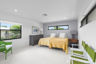 Welcome to this beautifully updated second-floor residence on Quail Ridge Golf Course and Country Club in Florida - for sale on GolfHomes.com, golf home, golf lot