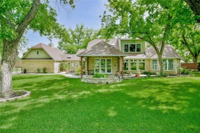 This exceptional residence in Pecan Plantation, is a stone and on Pecan Plantation Country Club in Texas - for sale on GolfHomes.com, golf home, golf lot
