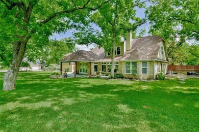 This exceptional residence in Pecan Plantation, is a stone and on Pecan Plantation Country Club in Texas - for sale on GolfHomes.com, golf home, golf lot