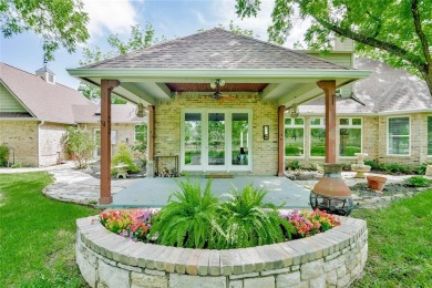 This exceptional residence in Pecan Plantation, is a stone and on Pecan Plantation Country Club in Texas - for sale on GolfHomes.com, golf home, golf lot