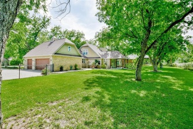 This exceptional residence in Pecan Plantation, is a stone and on Pecan Plantation Country Club in Texas - for sale on GolfHomes.com, golf home, golf lot