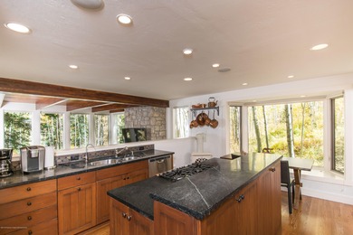 Newly renovated and professionally redecorated 5 bed/5 bath home on The Snowmass Club in Colorado - for sale on GolfHomes.com, golf home, golf lot