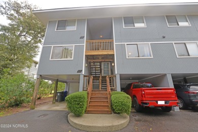 This beautiful three bedroom condo on the golf course at Caswell on Oak Island Golf Club in North Carolina - for sale on GolfHomes.com, golf home, golf lot