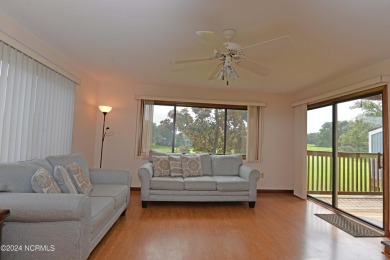 This beautiful three bedroom condo on the golf course at Caswell on Oak Island Golf Club in North Carolina - for sale on GolfHomes.com, golf home, golf lot