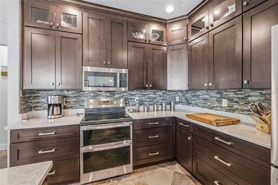 Welcome to this move-in ready 5 bedroom + bonus room, 4 bathroom on Heritage Harbor Golf and Country Club in Florida - for sale on GolfHomes.com, golf home, golf lot