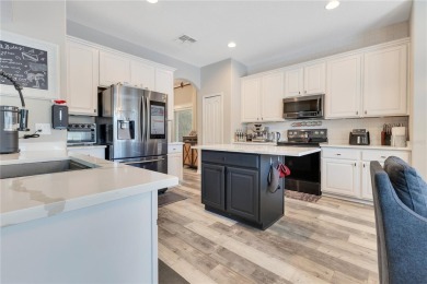 Welcome to this updated 4-bedroom, 3-bath pool home with a loft on North Shore Golf Club in Florida - for sale on GolfHomes.com, golf home, golf lot