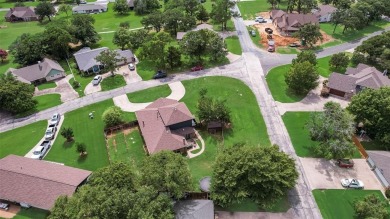 Live the dream at 315 Navajo in the coveted, gated community of on Lake Kiowa Golf Course in Texas - for sale on GolfHomes.com, golf home, golf lot