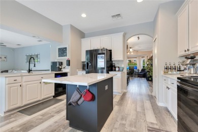 Welcome to this updated 4-bedroom, 3-bath pool home with a loft on North Shore Golf Club in Florida - for sale on GolfHomes.com, golf home, golf lot