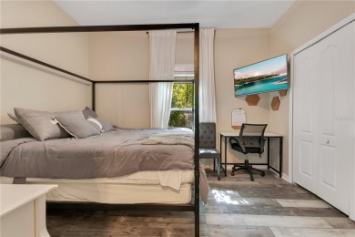 Welcome to this updated 4-bedroom, 3-bath pool home with a loft on North Shore Golf Club in Florida - for sale on GolfHomes.com, golf home, golf lot
