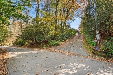 This charming three bedroom, three and one-half bath home is all on Highlands Country Club in North Carolina - for sale on GolfHomes.com, golf home, golf lot