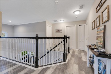 Welcome to this updated 4-bedroom, 3-bath pool home with a loft on North Shore Golf Club in Florida - for sale on GolfHomes.com, golf home, golf lot