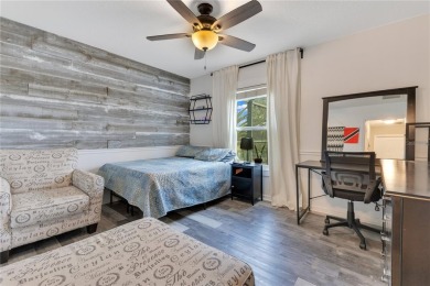 Welcome to this updated 4-bedroom, 3-bath pool home with a loft on North Shore Golf Club in Florida - for sale on GolfHomes.com, golf home, golf lot