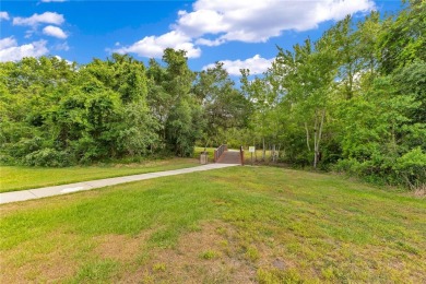 Welcome to this updated 4-bedroom, 3-bath pool home with a loft on North Shore Golf Club in Florida - for sale on GolfHomes.com, golf home, golf lot