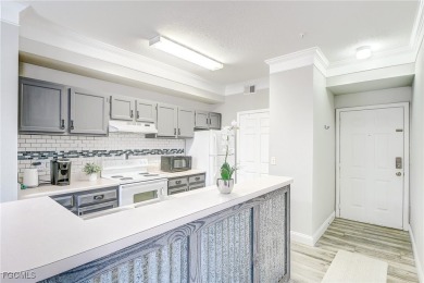 Rarely available TURNKEY first-floor end unit in Royal Greens at on Gateway Golf and Country Club in Florida - for sale on GolfHomes.com, golf home, golf lot