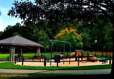 Nestled amongst the trees in a beautiful natural setting on a on Stillwaters Golf and Country Club in Alabama - for sale on GolfHomes.com, golf home, golf lot