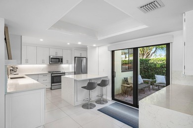 Beautifully updated 3BR/3BA first-floor residence offering on Quail Ridge Golf Course and Country Club in Florida - for sale on GolfHomes.com, golf home, golf lot