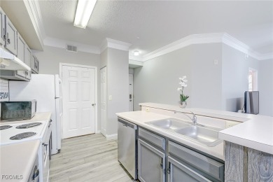 Rarely available TURNKEY first-floor end unit in Royal Greens at on Gateway Golf and Country Club in Florida - for sale on GolfHomes.com, golf home, golf lot