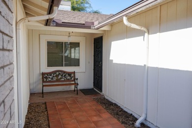 Welcome home to this charming 4-bedroom, 2-bath retreat nestled on Ahwatukee Country Club in Arizona - for sale on GolfHomes.com, golf home, golf lot