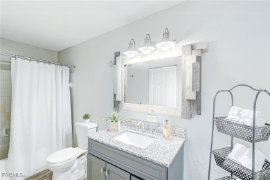 Rarely available TURNKEY first-floor end unit in Royal Greens at on Gateway Golf and Country Club in Florida - for sale on GolfHomes.com, golf home, golf lot