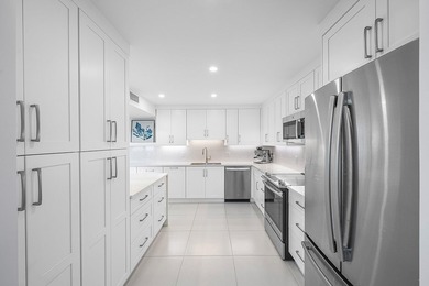 Beautifully updated 3BR/3BA first-floor residence offering on Quail Ridge Golf Course and Country Club in Florida - for sale on GolfHomes.com, golf home, golf lot