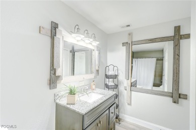Rarely available TURNKEY first-floor end unit in Royal Greens at on Gateway Golf and Country Club in Florida - for sale on GolfHomes.com, golf home, golf lot