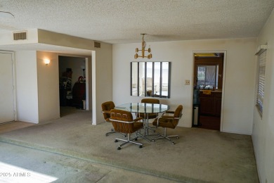 Welcome home to this charming 4-bedroom, 2-bath retreat nestled on Ahwatukee Country Club in Arizona - for sale on GolfHomes.com, golf home, golf lot