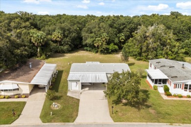 2024 NEW SHINGLE ROOF, gorgeous 3/2 modern split plan with on Zellwood Station Country Club in Florida - for sale on GolfHomes.com, golf home, golf lot