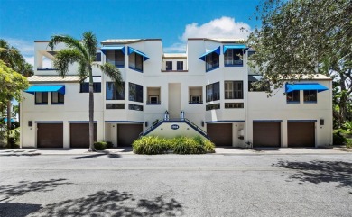 Bathed in natural light, this 2BR, 2.5BA townhome in Fairway Bay on Longboat Key Golf Club Resort in Florida - for sale on GolfHomes.com, golf home, golf lot