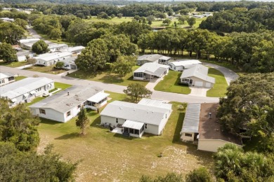 2024 NEW SHINGLE ROOF, gorgeous 3/2 modern split plan with on Zellwood Station Country Club in Florida - for sale on GolfHomes.com, golf home, golf lot