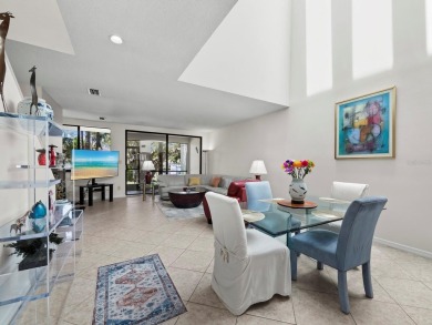 Bathed in natural light, this 2BR, 2.5BA townhome in Fairway Bay on Longboat Key Golf Club Resort in Florida - for sale on GolfHomes.com, golf home, golf lot