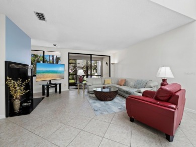 Bathed in natural light, this 2BR, 2.5BA townhome in Fairway Bay on Longboat Key Golf Club Resort in Florida - for sale on GolfHomes.com, golf home, golf lot