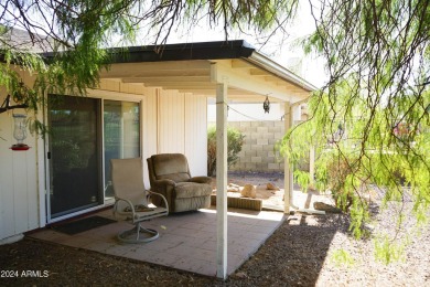 Welcome home to this charming 4-bedroom, 2-bath retreat nestled on Ahwatukee Country Club in Arizona - for sale on GolfHomes.com, golf home, golf lot