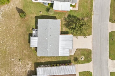 2024 NEW SHINGLE ROOF, gorgeous 3/2 modern split plan with on Zellwood Station Country Club in Florida - for sale on GolfHomes.com, golf home, golf lot
