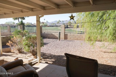 Welcome home to this charming 4-bedroom, 2-bath retreat nestled on Ahwatukee Country Club in Arizona - for sale on GolfHomes.com, golf home, golf lot