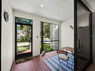 Bathed in natural light, this 2BR, 2.5BA townhome in Fairway Bay on Longboat Key Golf Club Resort in Florida - for sale on GolfHomes.com, golf home, golf lot