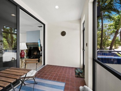 Bathed in natural light, this 2BR, 2.5BA townhome in Fairway Bay on Longboat Key Golf Club Resort in Florida - for sale on GolfHomes.com, golf home, golf lot