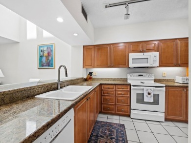 Bathed in natural light, this 2BR, 2.5BA townhome in Fairway Bay on Longboat Key Golf Club Resort in Florida - for sale on GolfHomes.com, golf home, golf lot