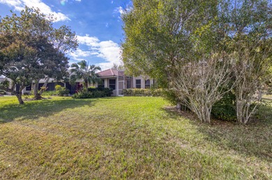 Spacious 3-bedroom, 2-bathroom home offering peaceful golf on St. Lucie Trail Golf Club in Florida - for sale on GolfHomes.com, golf home, golf lot