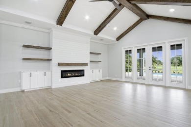 Located on PGA Golf Club's Dye Course, this luxury home has an on The Legacy Golf and Tennis Club in Florida - for sale on GolfHomes.com, golf home, golf lot