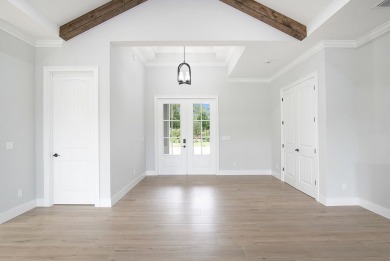 Located on PGA Golf Club's Dye Course, this luxury home has an on The Legacy Golf and Tennis Club in Florida - for sale on GolfHomes.com, golf home, golf lot