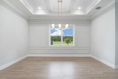 Located on PGA Golf Club's Dye Course, this luxury home has an on The Legacy Golf and Tennis Club in Florida - for sale on GolfHomes.com, golf home, golf lot