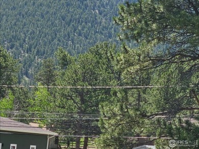 Charming cabin near Estes Park's 18 Hole Golf Course! Two on Estes Park Golf Course in Colorado - for sale on GolfHomes.com, golf home, golf lot