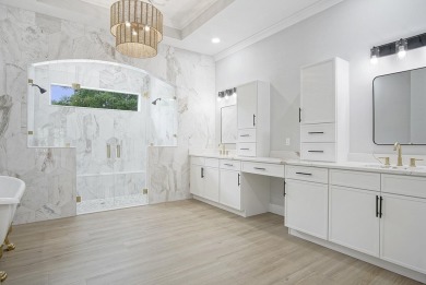 Located on PGA Golf Club's Dye Course, this luxury home has an on The Legacy Golf and Tennis Club in Florida - for sale on GolfHomes.com, golf home, golf lot