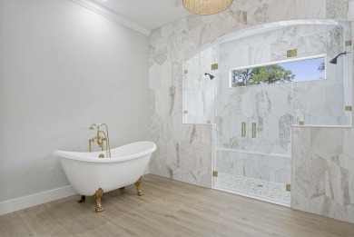 Located on PGA Golf Club's Dye Course, this luxury home has an on The Legacy Golf and Tennis Club in Florida - for sale on GolfHomes.com, golf home, golf lot
