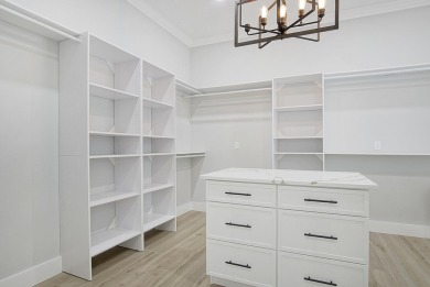 Located on PGA Golf Club's Dye Course, this luxury home has an on The Legacy Golf and Tennis Club in Florida - for sale on GolfHomes.com, golf home, golf lot