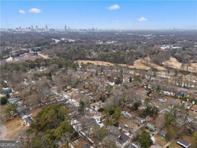 Welcome home to this East Lake Bungalow where vintage vibes meet on Charlie Yates Golf Course in Georgia - for sale on GolfHomes.com, golf home, golf lot