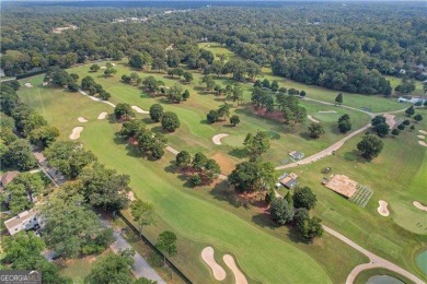 Welcome home to this East Lake Bungalow where vintage vibes meet on Charlie Yates Golf Course in Georgia - for sale on GolfHomes.com, golf home, golf lot