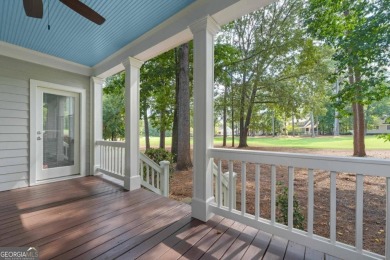 Welcome to this charming cottage nestled in the sought-after on Great Waters Course At Reynolds Plantation in Georgia - for sale on GolfHomes.com, golf home, golf lot